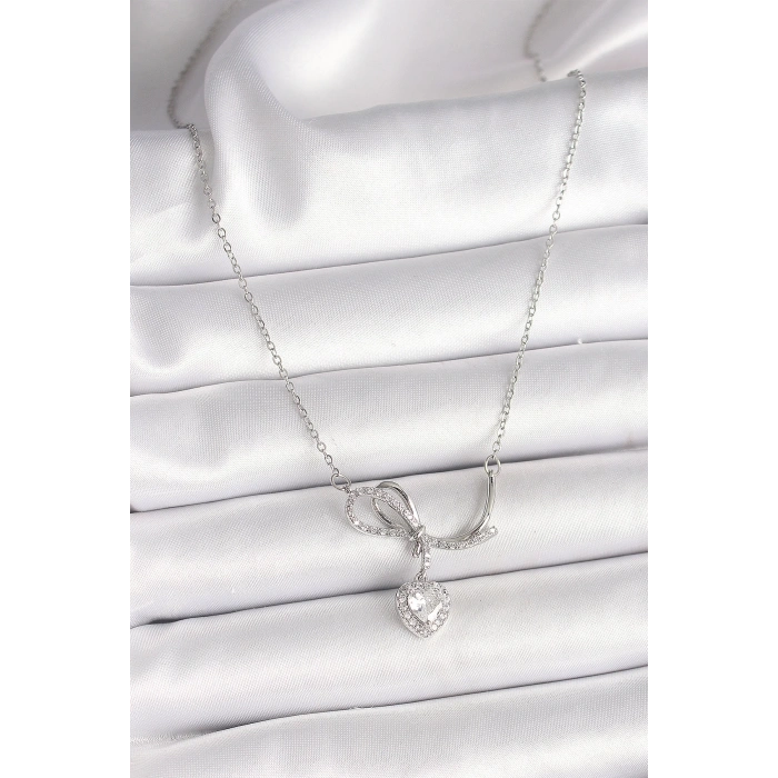 BFS 316L Çelik Gümüş Renk Zincir Zirkon Taşlı Düğüm Sallantı Kalp Figür Kadın Kolye