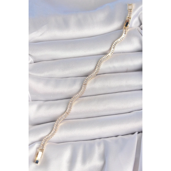 BFS Pirinç Gold Renk Su Yolu Zirkon Taşlı Model Kadın Bileklik