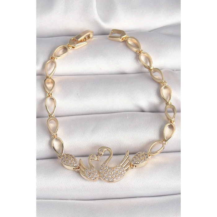 BFS Pirinç Gold Renk Zirkon Taşlı Kuğu Figür Damla Zincir Model Kadın Bileklik