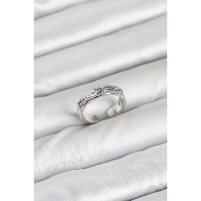 BFS Pirinç Gümüş Renk Mavi Zirkon Taşlı Kutup Yıldızı Model Kadın Yüzük