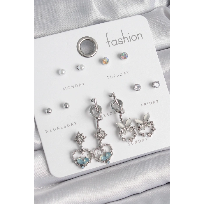 BFS Pirinç Gümüş Renk Sallantı Zirkon Taşlı Kalp Model Düğüm Detay 7 Çift Kadın Küpe Seti