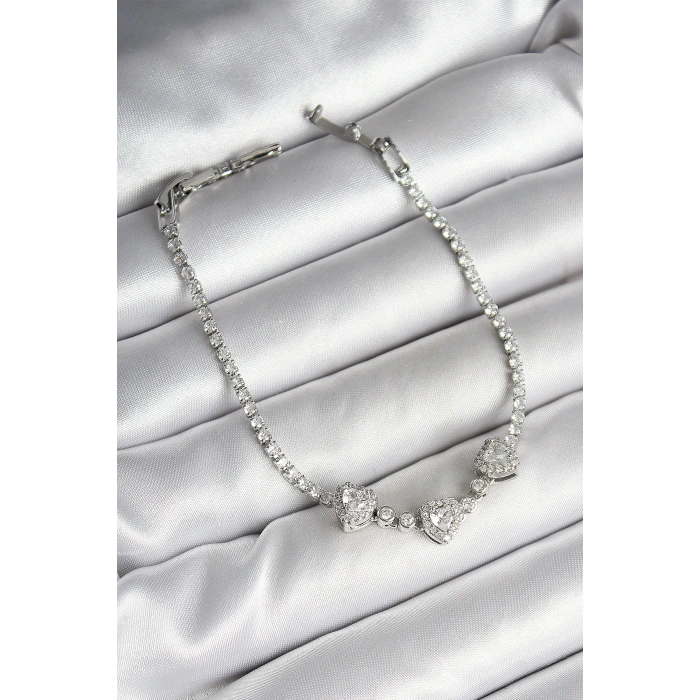 BFS Pirinç Sıralı Kalp Figürlü Zirkon Taşlı Gümüş Renk Kadın Bileklik