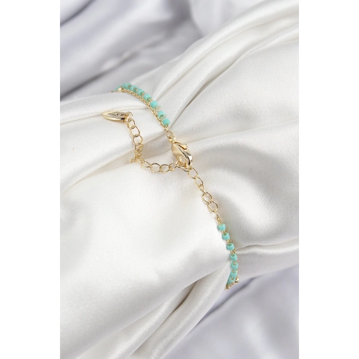 BFS Pirinç Zirkon Taşlı Mavi Boncuklu Model Gold Renk Kadın Bileklik