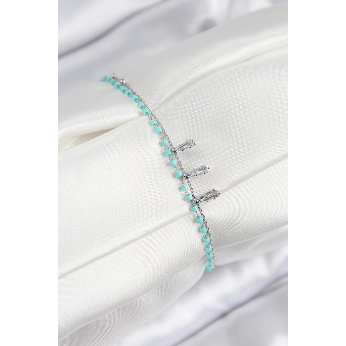 BFS Pirinç Zirkon Taşlı Mavi Boncuklu Model Gümüş Renk Kadın Bileklik