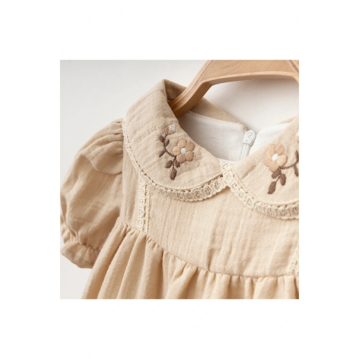 Çiçek Nakışlı Müslin Kız Bebe Elbise