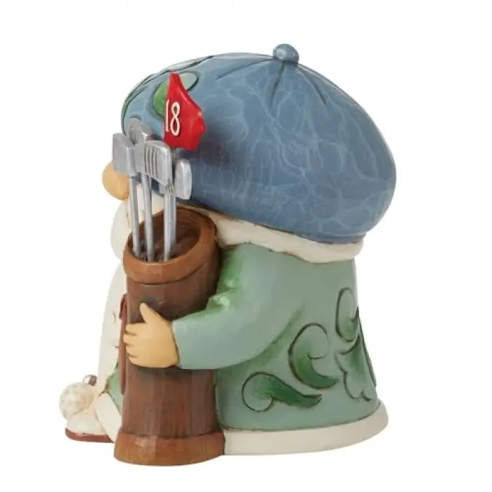 Golf oynayan gnome figürü