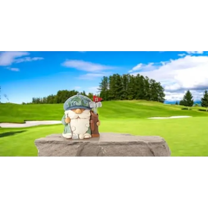 Golf oynayan gnome figürü