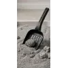 Plastik kedi kumu küreği
