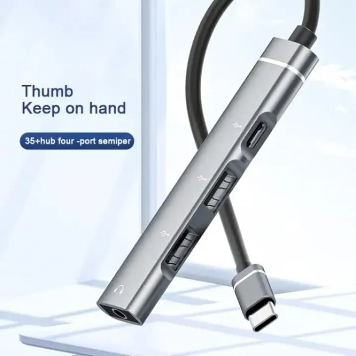 Ses Kartlı USB Hub Çoklayıcı Adaptör 4 in 1 Ses Kartlı USB/Type-c To USB 3.0, USB C ve 3.5mm Jak Çıkışlı Macbook Uyumlu Çevirici Adaptör Çok Portlu Çoklayıcı 4in1 USB HUB Gümüş Renk ZR615