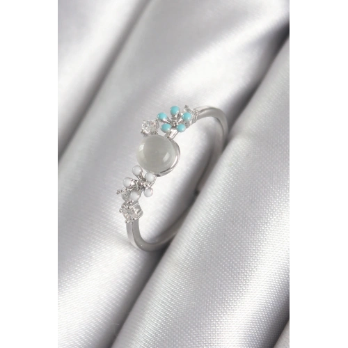 BFS Pirinç Gümüş Renk Zirkon Taş Detaylı Beyaz Sedefli Çiçek Model Kadın Yüzük