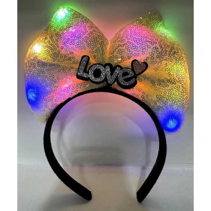 BFS     Led Işıklı 3 Farklı Fonksiyonda Yanan Gümüş Love Yazılı Sarı Fiyonk Taç 20X17 cm