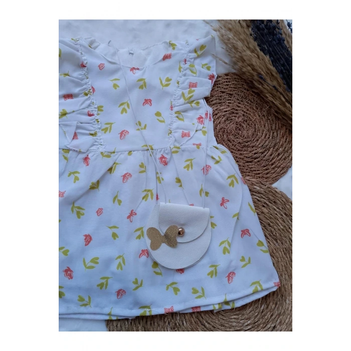 KIZ ÇOCUK YAPRAK DESENLİ ÇANTALI ELBİSE