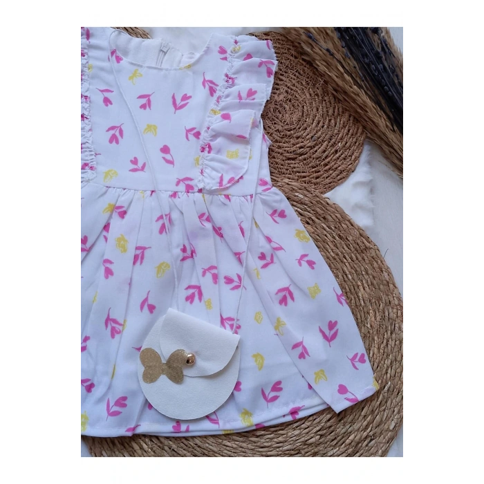 KIZ ÇOCUK YAPRAK DESENLİ ÇANTALI ELBİSE