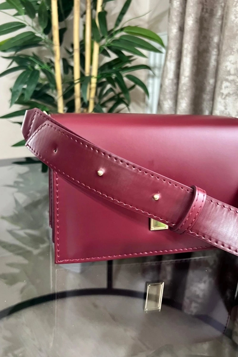 Karmin Model Bordo Renk Deri Kol Çantası