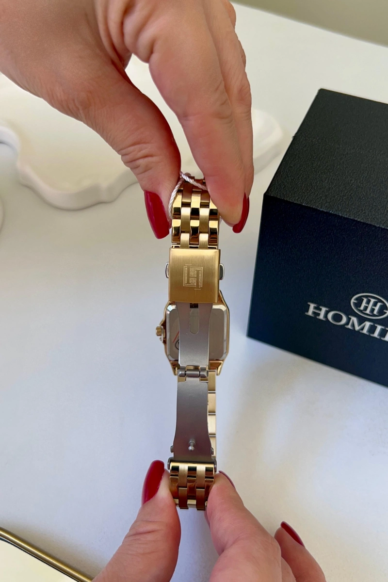 C. Model Homies HM19390S04-1 Çelik Kordon Kadın Kol Saati