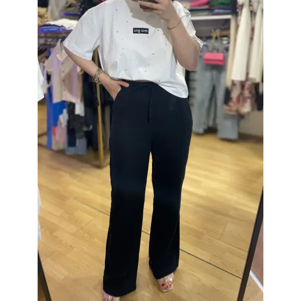 Müslin flare kesim yüksek bel lastikli beyaz pantolon