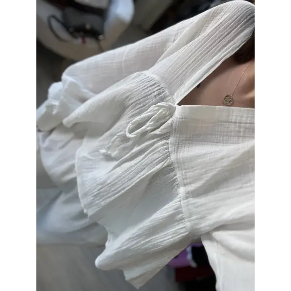 Müslin kumaş balon kol bağlama detaylı beyaz bluz