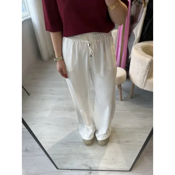 Yüksek bel beli lastikli kusur örtücü beyaz palazzo