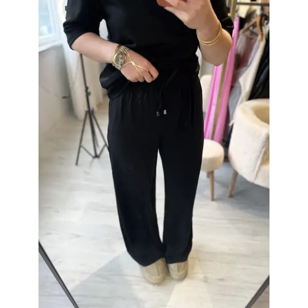 Yüksek bel beli lastikli kusur örtücü siyah palazzo