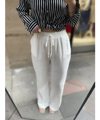 Müslin flare kesim yüksek bel lastikli beyaz pantolon