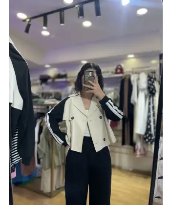 Tasarım kol şeritli trenç