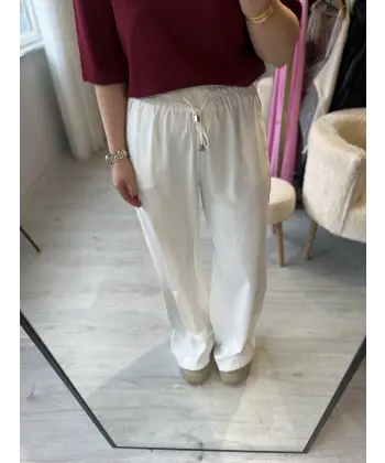 Yüksek bel beli lastikli kusur örtücü beyaz palazzo