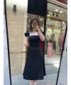 Tasarım kol detaylı siyah midi elbise