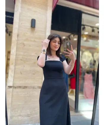 Tasarım kol detaylı siyah midi elbise