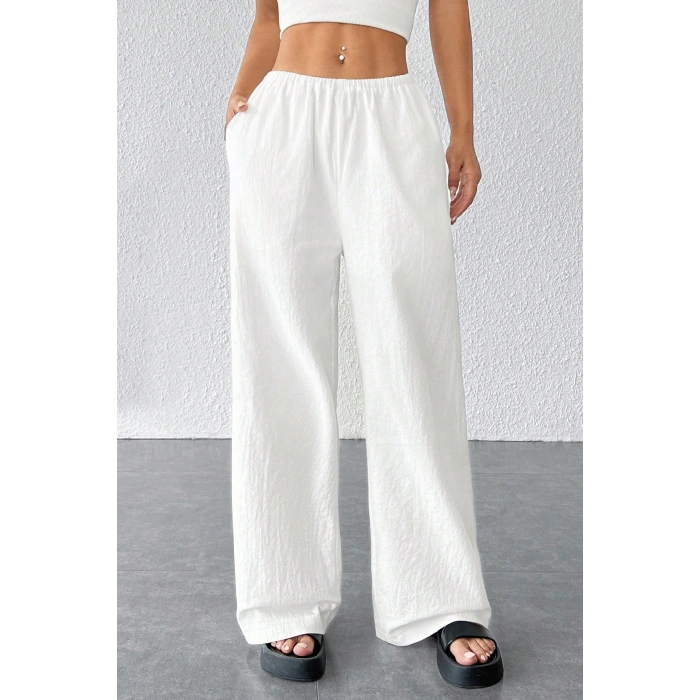 Kadın Beyaz Bol Kesim Cepli Geniş Paça Dökümlü Pantolon