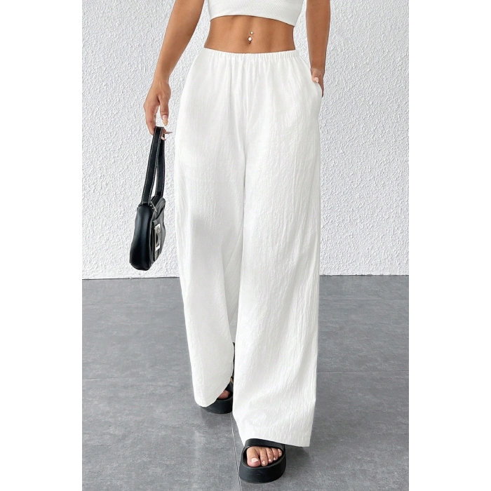 Kadın Beyaz Bol Kesim Cepli Geniş Paça Dökümlü Pantolon