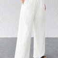 Kadın Beyaz Bol Kesim Cepli Geniş Paça Dökümlü Pantolon