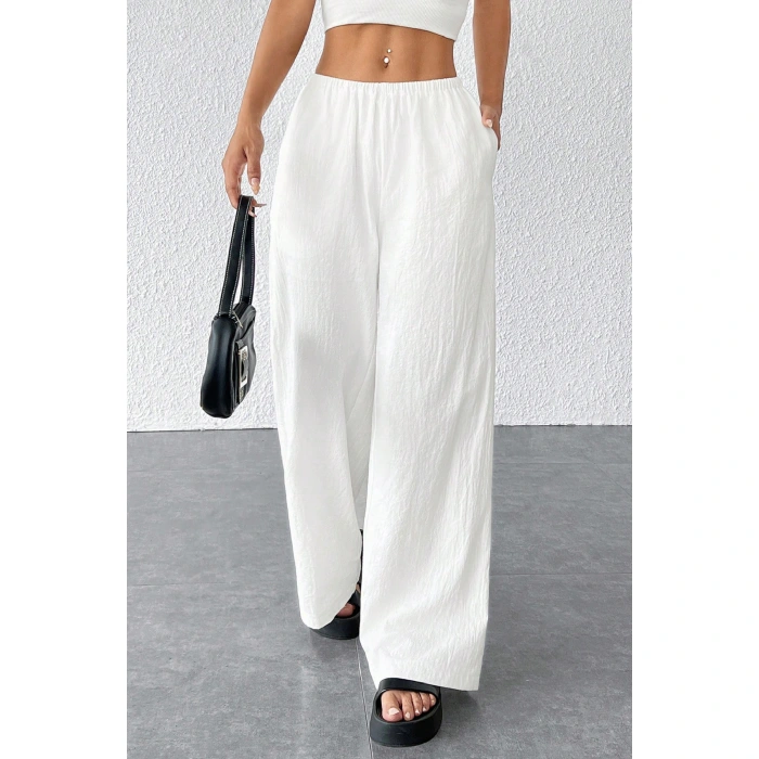 Kadın Beyaz Bol Kesim Cepli Geniş Paça Dökümlü Pantolon