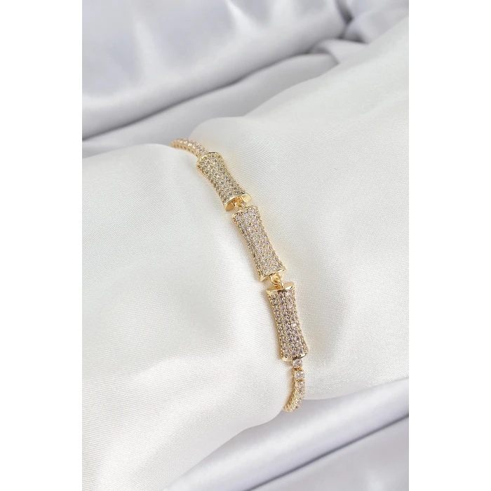 Pirinç Gold Renk Zirkon Taşlı Kemik Model Kadın Bileklik