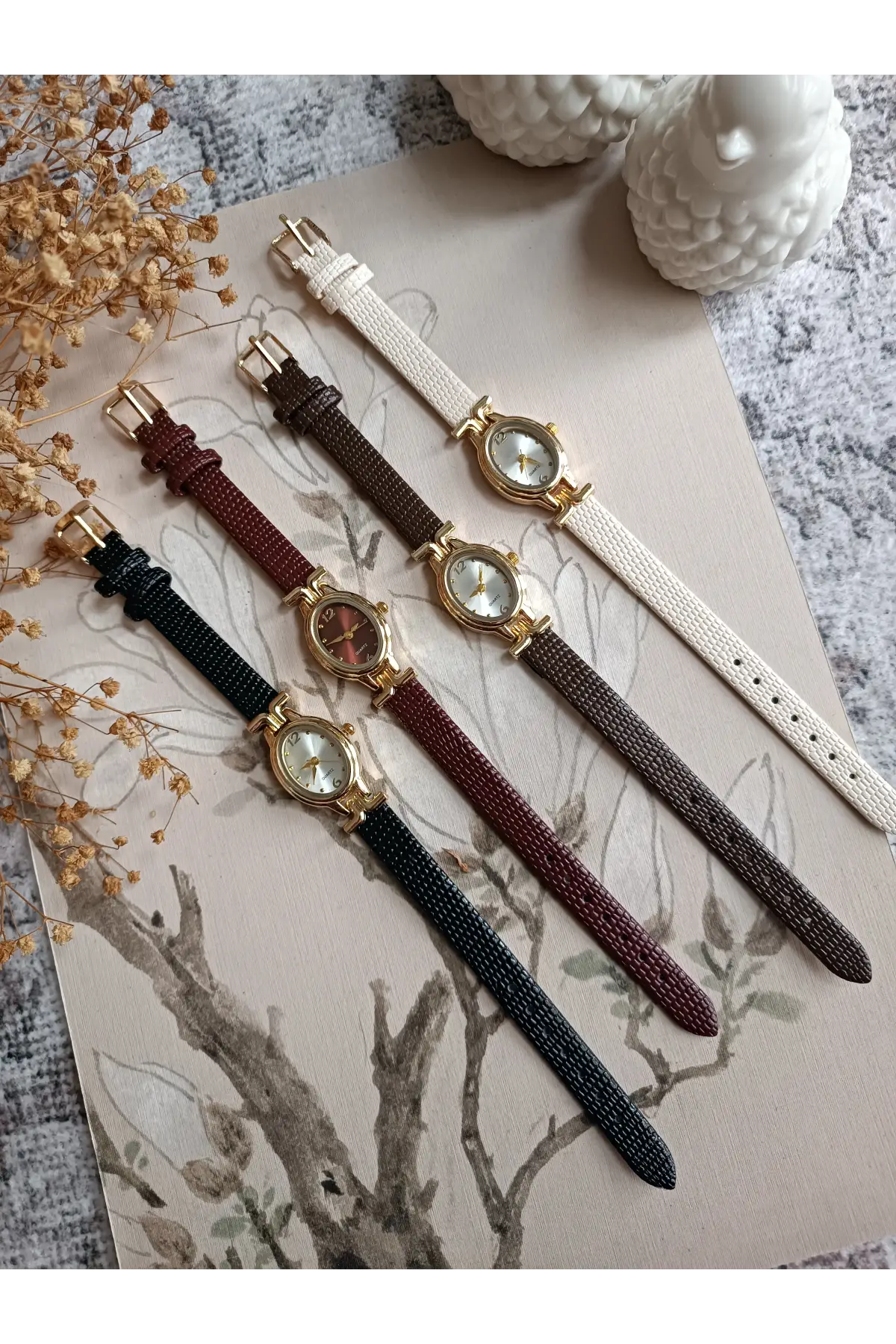 Kaira Siyah Desenli Deri Beyaz Kardan Oval Minimal Kadın Kol Saati