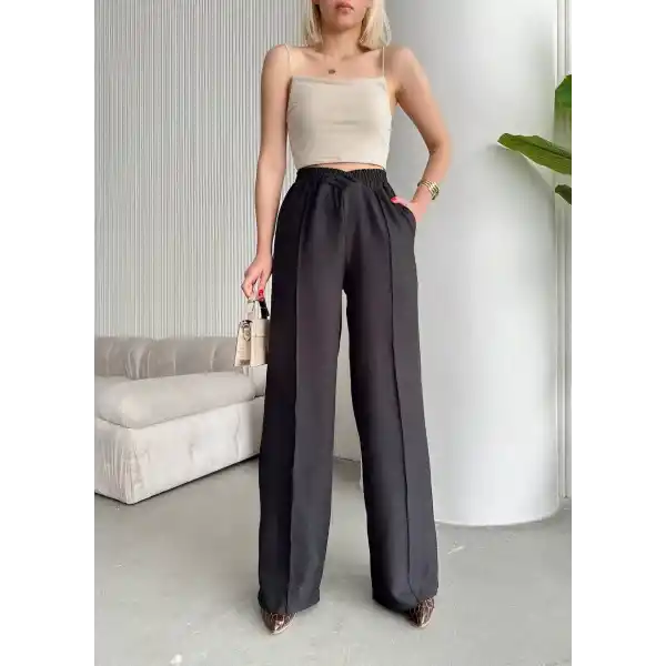 Beli çapraz pantolon