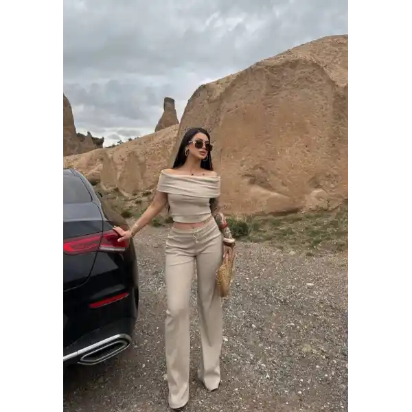 Madonna yaka bol paça pantolonlu takım