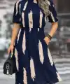 Kadın Kısa Kollu Yarı Balıkçı Yaka Ceplı Desenli Midi Elbise