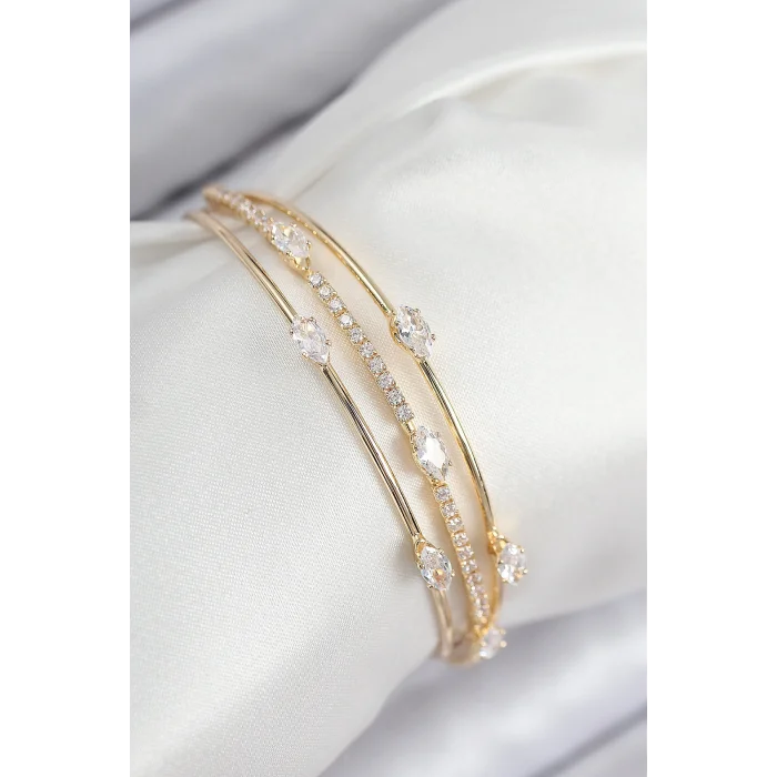 Pirinç Zirkon Taşlı Su Yolu Model Gold Renk Kadın Bileklik