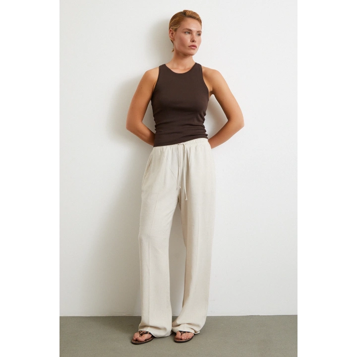 Beli Lastikli Boru Paça Pantolon Bej