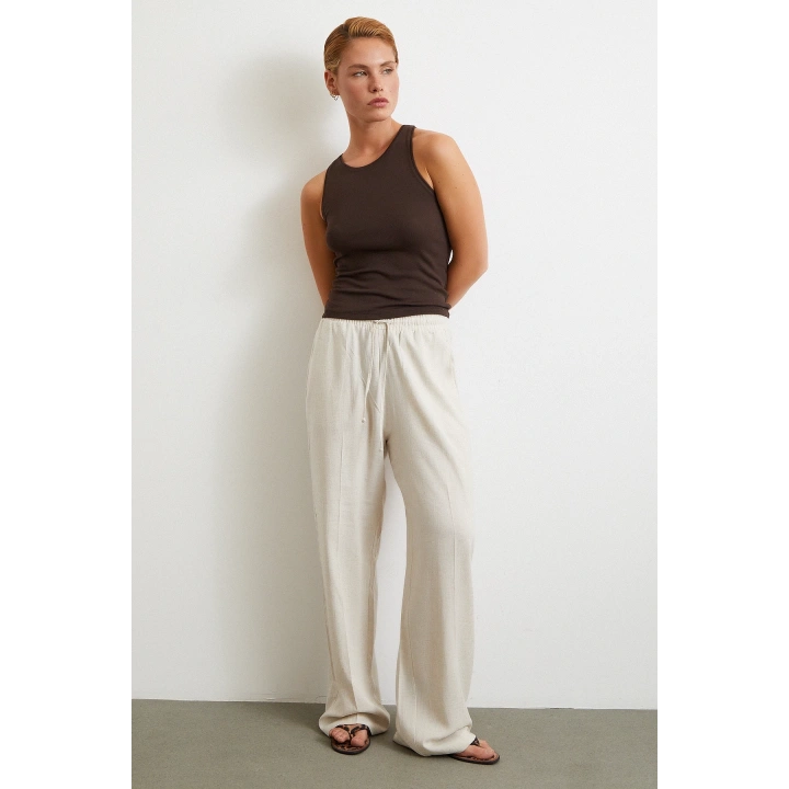 Beli Lastikli Boru Paça Pantolon Bej