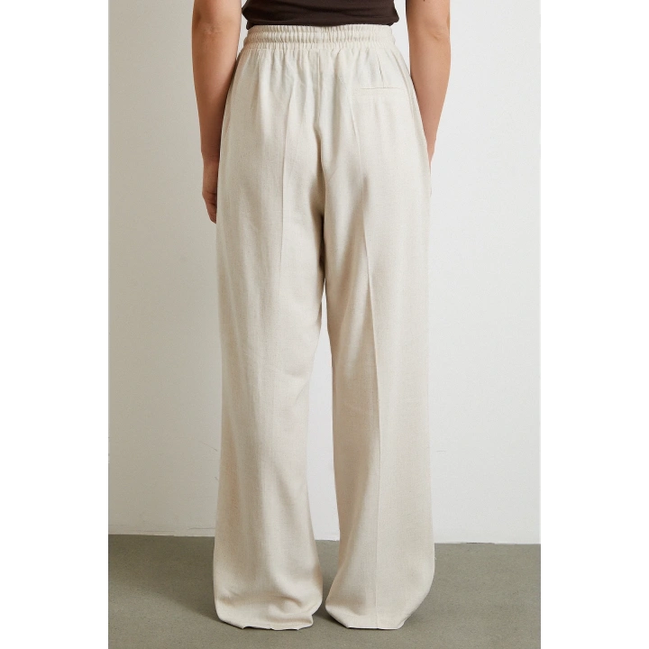 Beli Lastikli Boru Paça Pantolon Bej