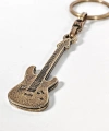Antik Bronz Gitar Figürlü Metal Anahtarlık – Müziğin Özgür Ruhu ve Zamansız Stil