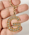 G Harfi Taşlı Gold Renk Metal Anahtarlık – Şık ve Işıltılı Harf Tasarımı
