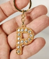 P Harfi Taşlı Gold Renk Metal Anahtarlık – Şık ve Işıltılı Harf Tasarımı