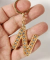 N Harfi Taşlı Gold Renk Metal Anahtarlık – Şık ve Işıltılı Harf Tasarımı