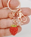 Zirkon Taşlı Kar Tanesi ve Kalp Detaylı Çilek Figürlü Rose Gold Anahtarlık