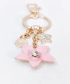 Zirkon Taşlı Yıldız ve Çiçek Figürlü Rose Gold Lüks Anahtarlık & Çanta Aksesuarı