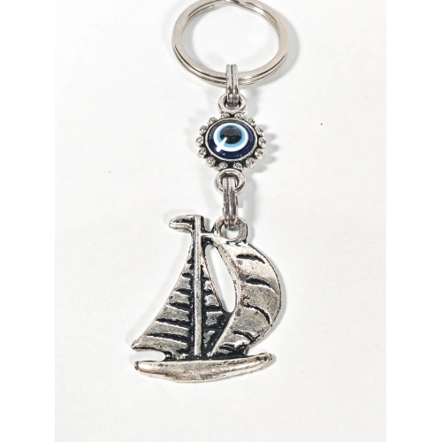 Yelkenli & Nazar Boncuğu Figürlü Anahtarlık – Koruma, Özgürlük ve Yolculuk Sembolü