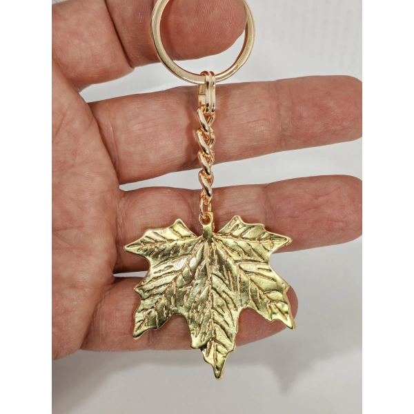 Dokulu Yaprak Anahtarlık Gold Renk – Zarif Doğa Temalı Şık Çanta & Anahtar Aksesuarı
