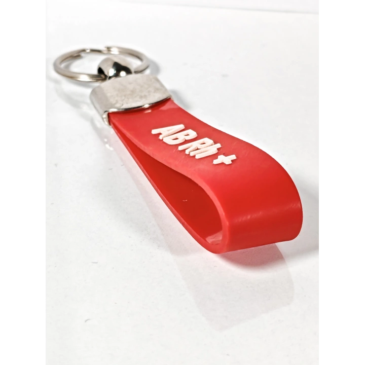 AB Rh(+) Pozitif Kan Grubu Silikon Anahtarlık – Acil Durumlar İçin Hayati Bilgi